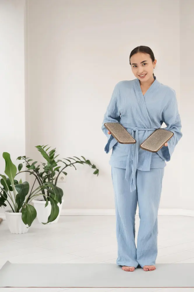 Women Wearing Studiounifomrs custom SPA uniform in Blue Color