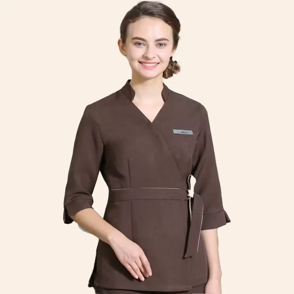 women wearing brown top spa uniform jacket by studio uniforms