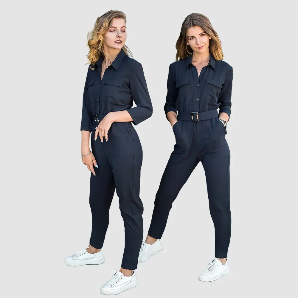 women wearing black tunics sets for SPA uniform provided by studio uniforms